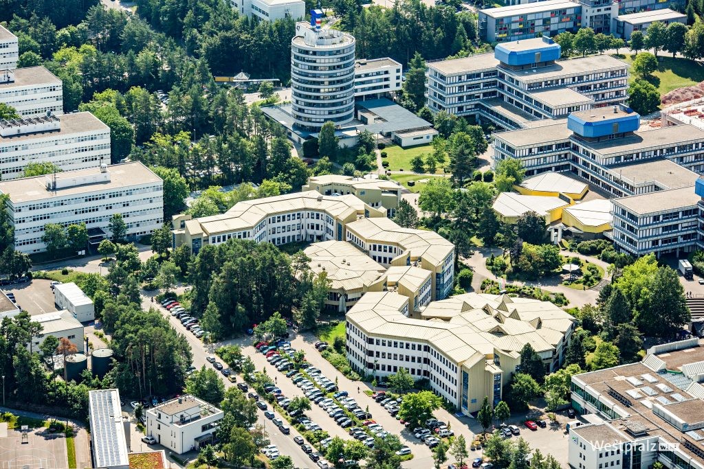 Aerial view of TU Kaiserslautern campus buildings surrounded by trees